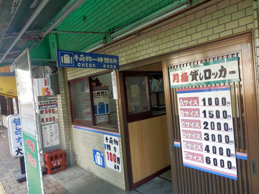 Typical luggage storage place in Kamagasaki. The rates displayed are per month.